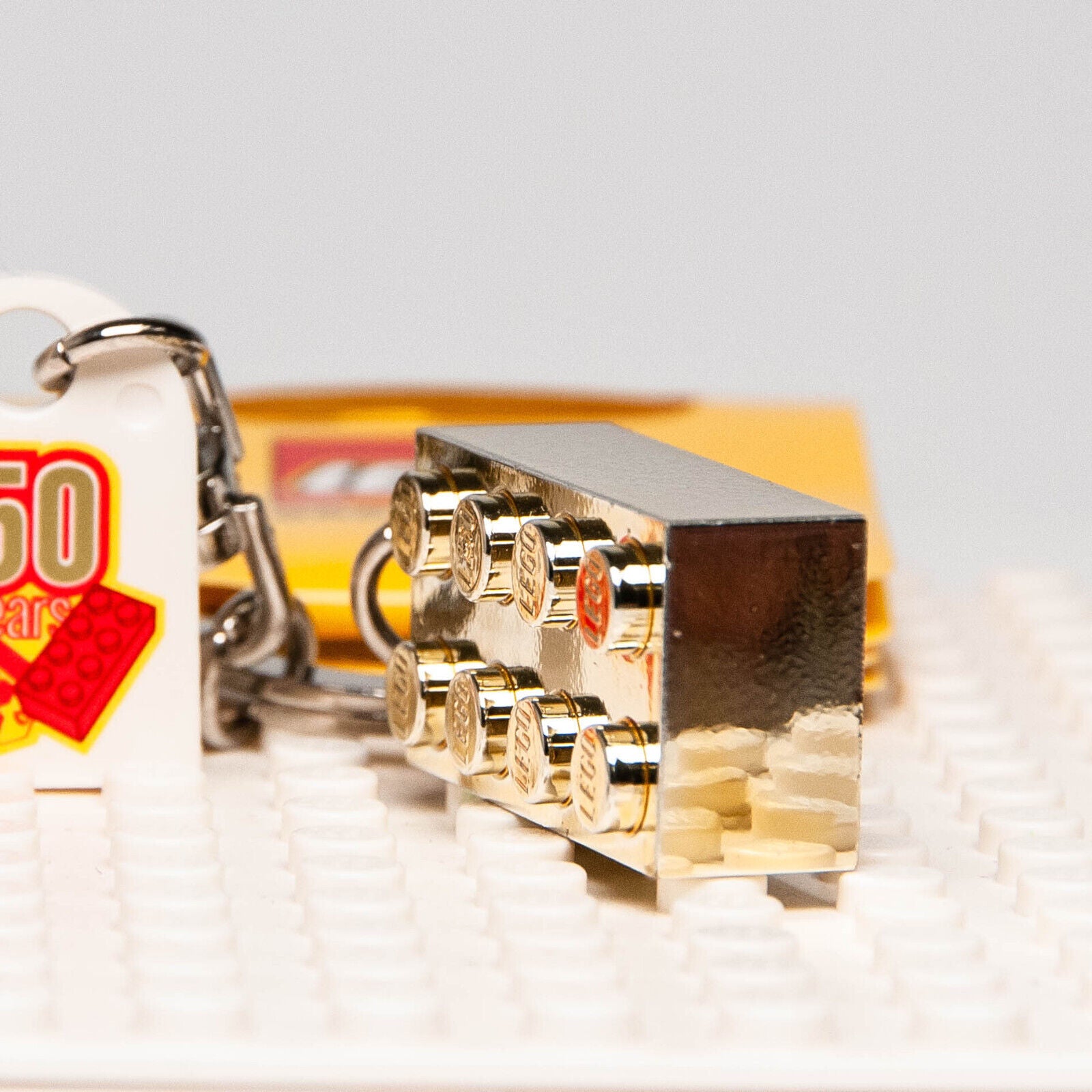 NEW Lego 50 years Anniversary Gold Brick Keychain -  2008 (852445) - StudBee