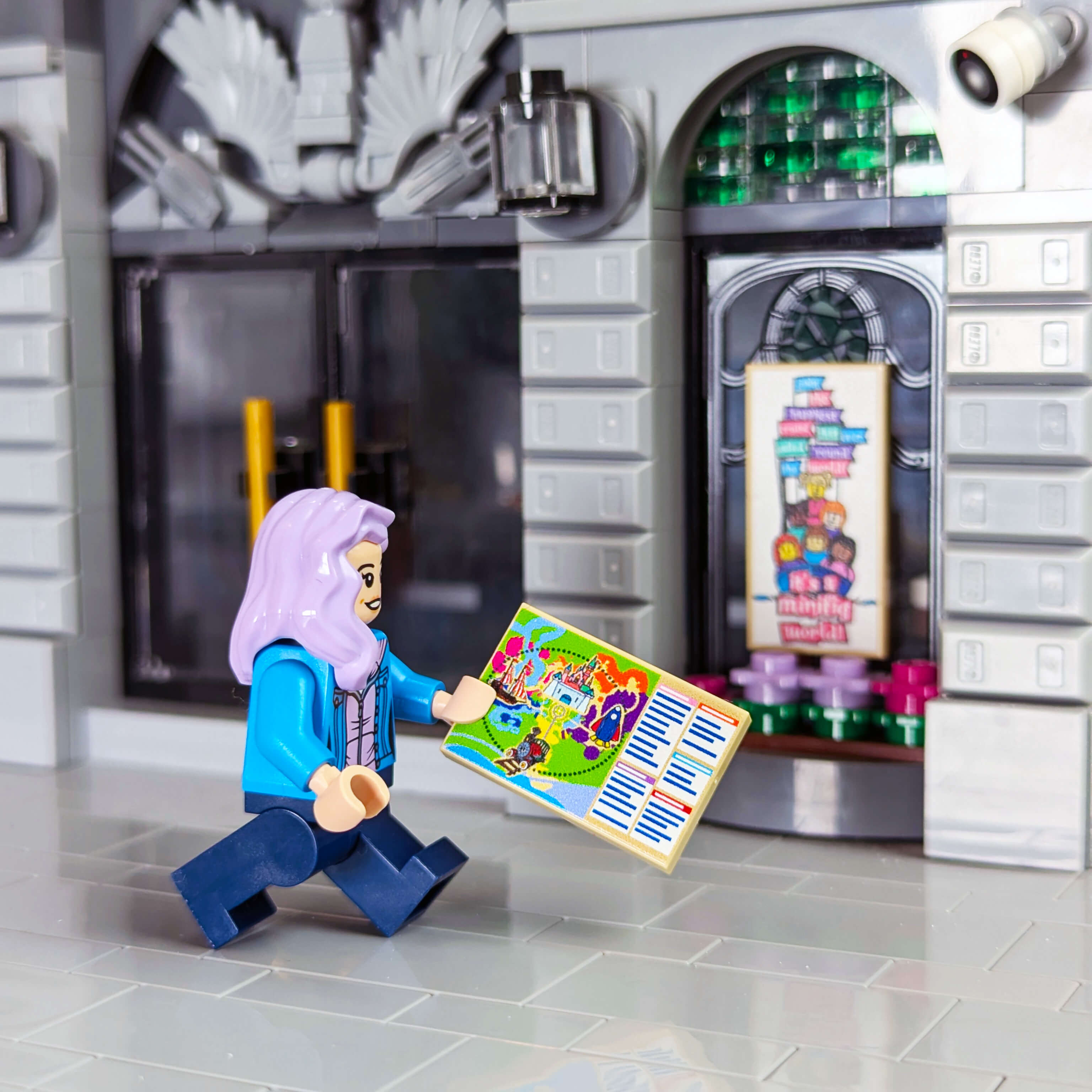 Minifig holding a theme park map in front of a toy restaurant set