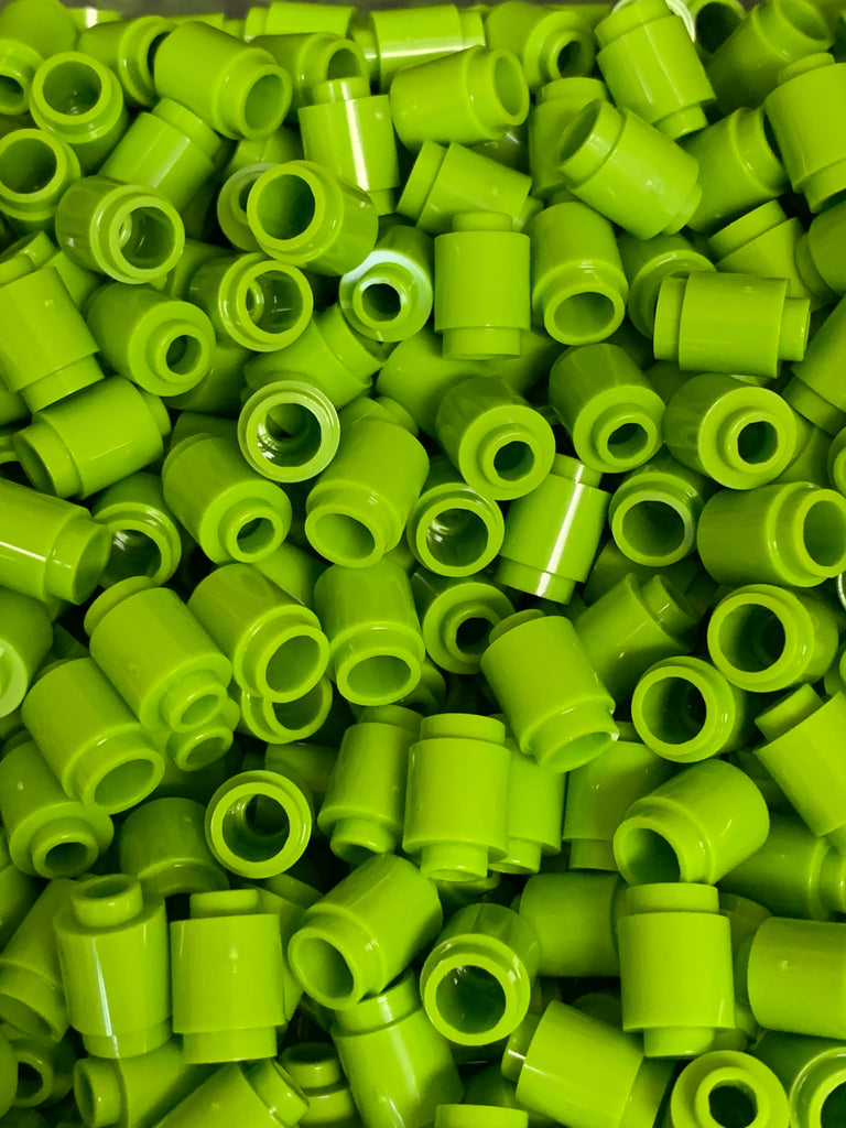 Green cylinder lego bricks