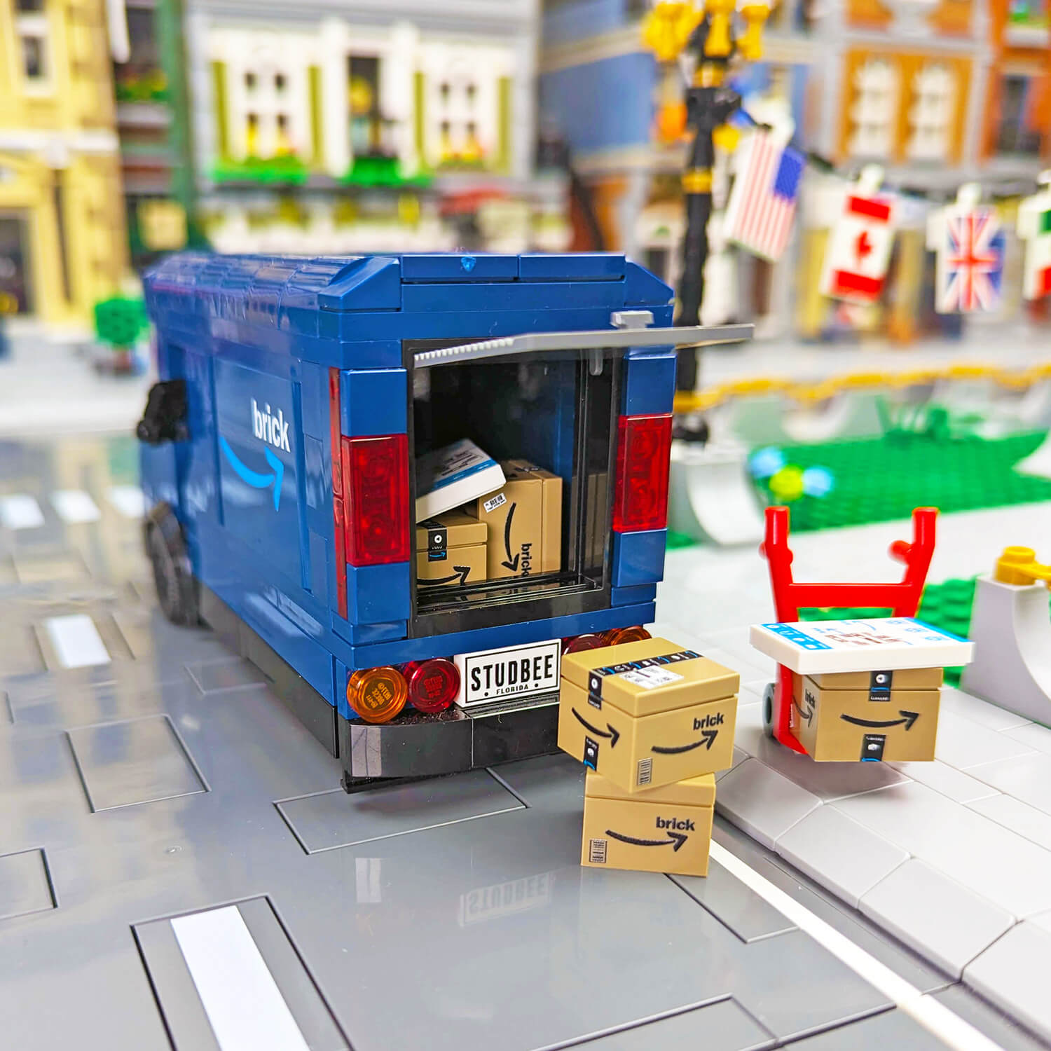 delivery truck made from lego with boxes in a city street setting lego moc