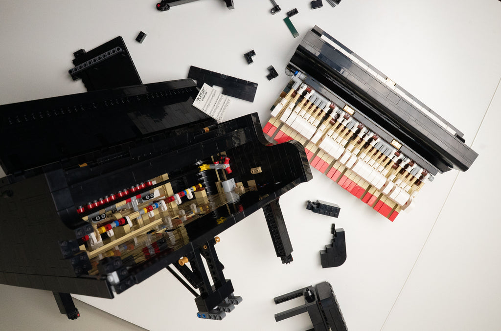a broken apart lego piano