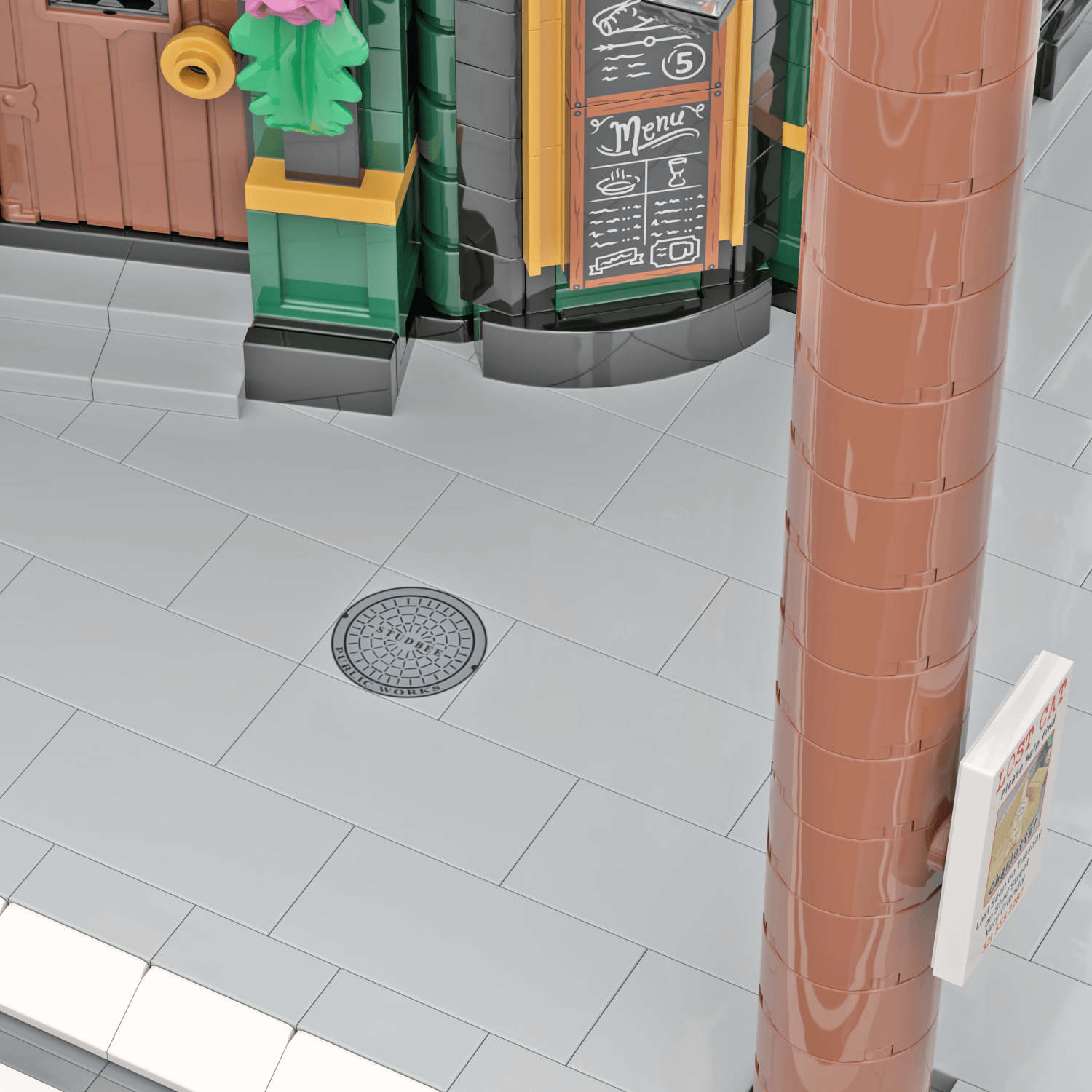 Printed Manhole Cover On LEGO tile in a LEGO city sidewalk with telegraph pole and building in the background