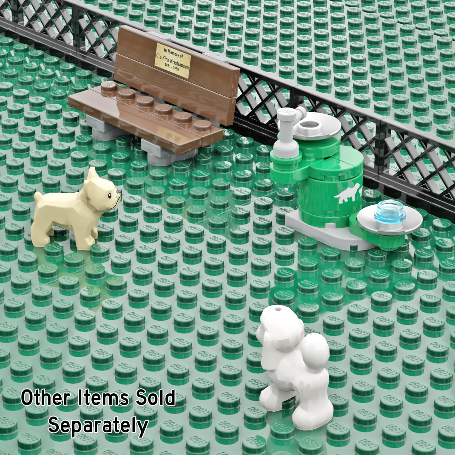 LEGO pet water fountain building set with a bench, and small LEGO dogs on a green LEGO base plate.