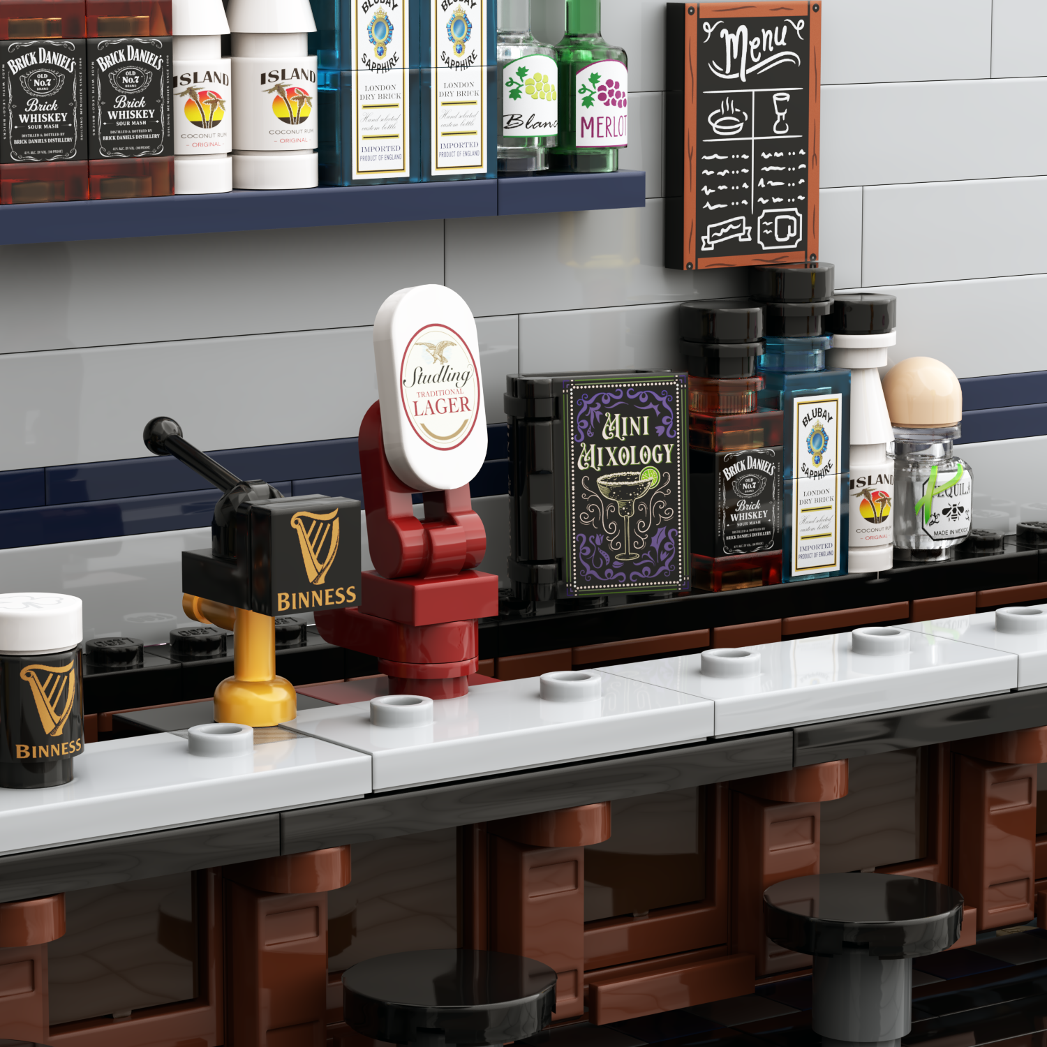 LEGO bar scene with a red and white Yuengling Lager tap handle, a black and gold Guinness tap fixture, a small black menu sign, and several branded bottle figures lined up behind a white and gray counter.