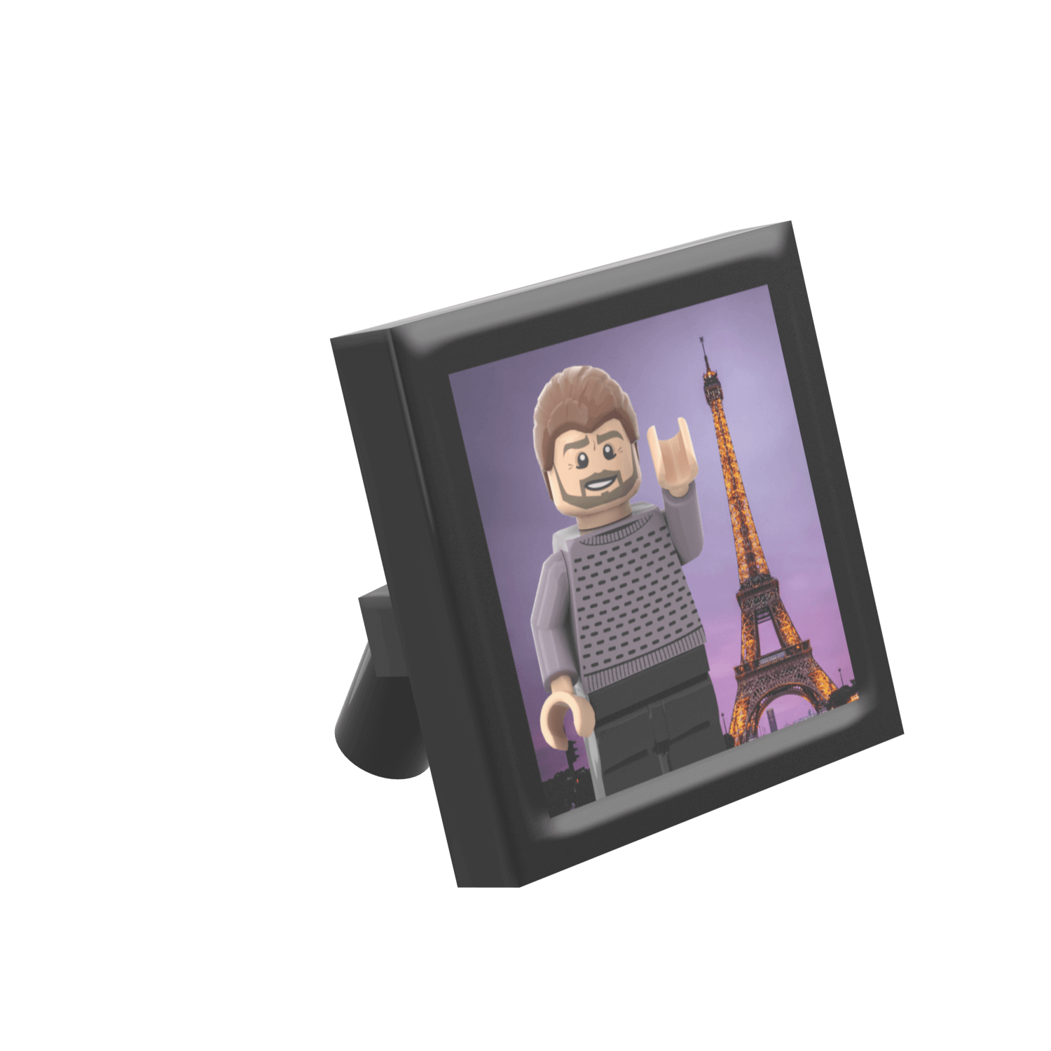 A framed travel picture featuring a LEGO minifigure in front of the Eiffel Tower.