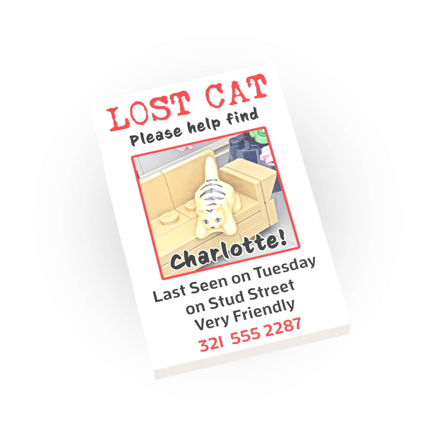 Lost cat poster with a cat illustration and contact information printed on a LEGO tile on a white background