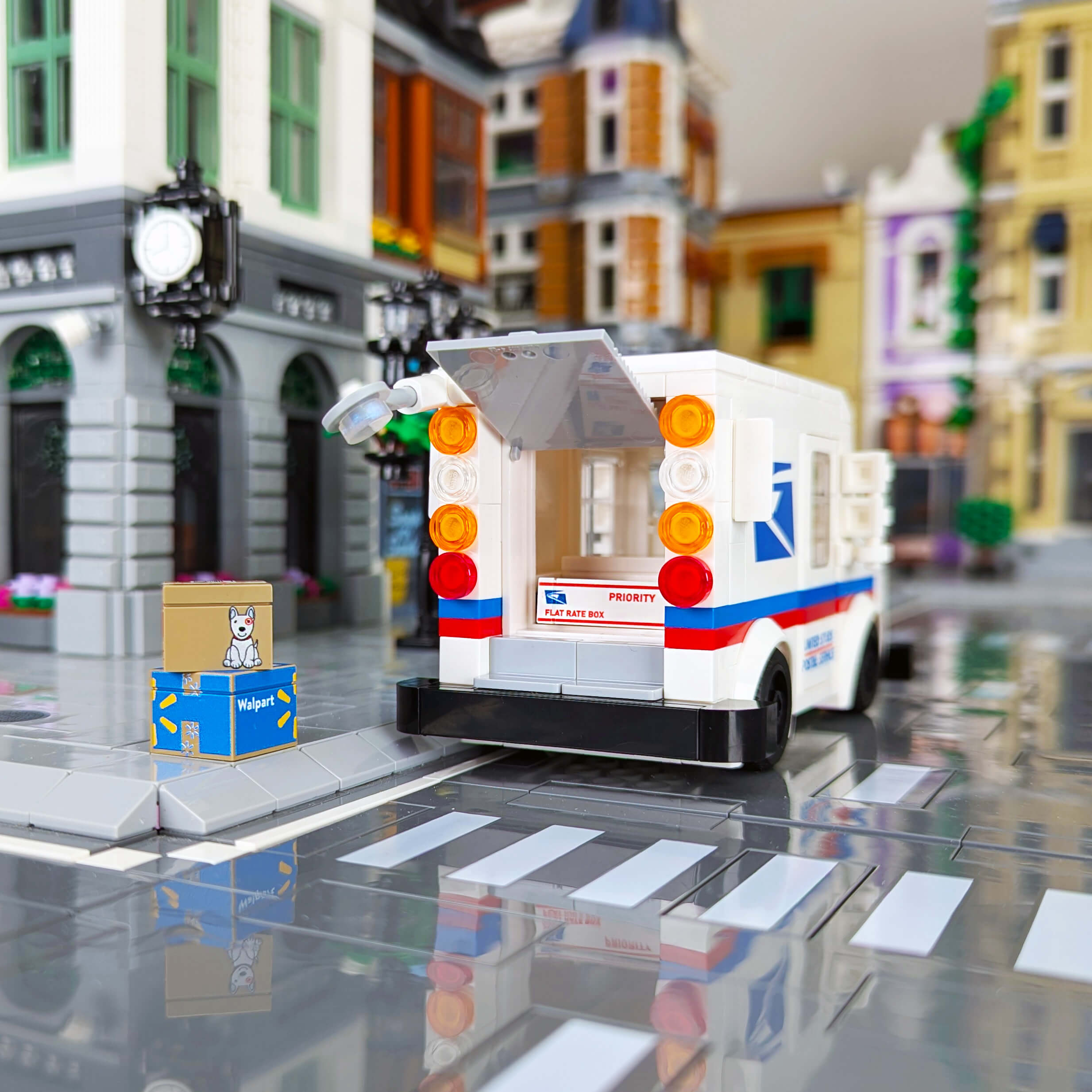 Mail delivery truck with open rear door delivering packages