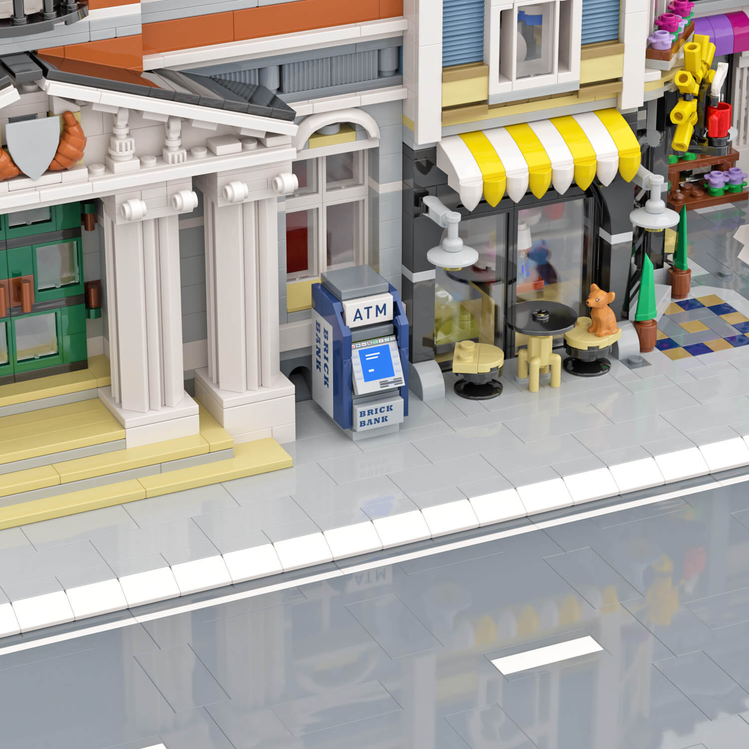 ATM building set model against a building  in a LEGO city with cafe and sidewalk