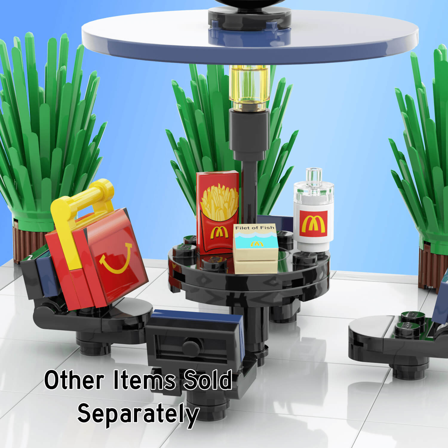 Black and blue picnic table, with mcbricks/mcdonalds kids meal, fries, filet o fish,drink on the table with background plants on a light blue background.