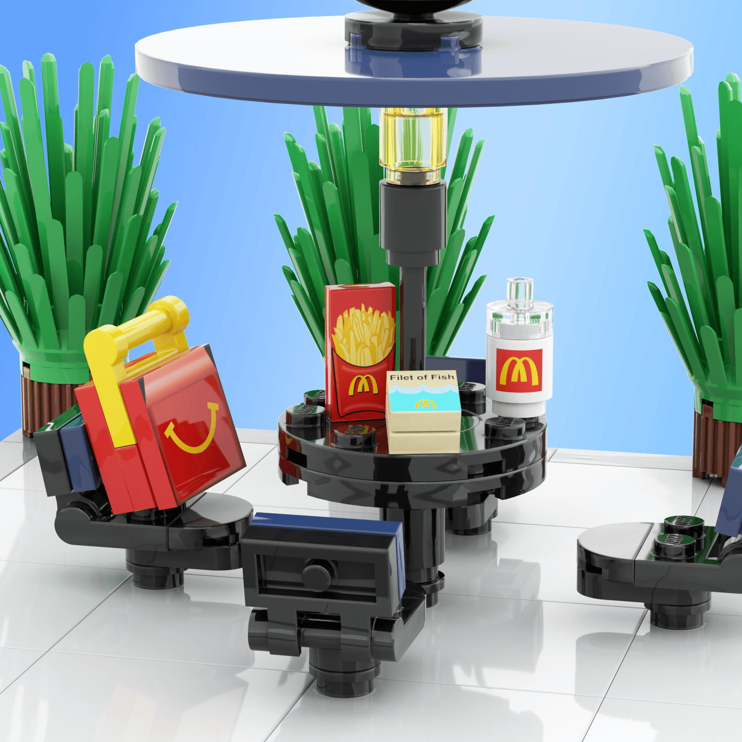 Black and blue picnic table, with mcbricks/mcdonalds kids meal, fries, filet o fish,drink on the table with background plants on a light blue background.