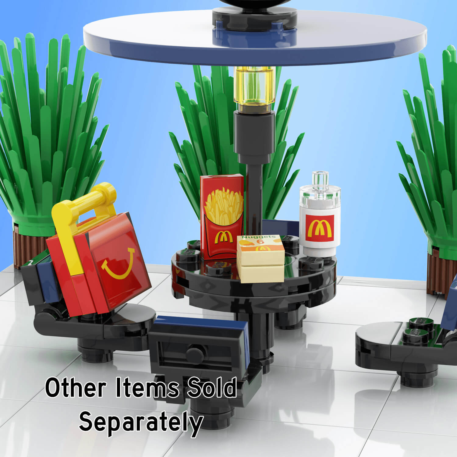 Black and blue picnic table, with mcbricks/mcdonalds kids meal, fries, mcnuggets,drink on the table with background plants on a light blue background.