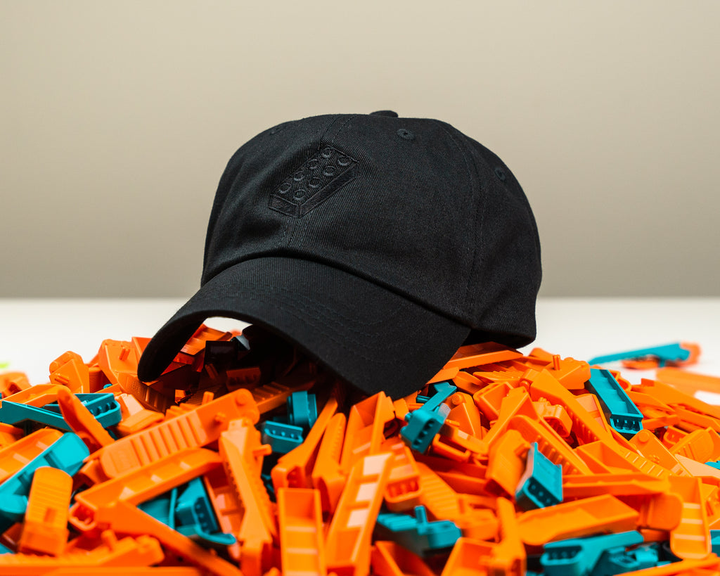 Classic dad hat with black lego brick embroidery