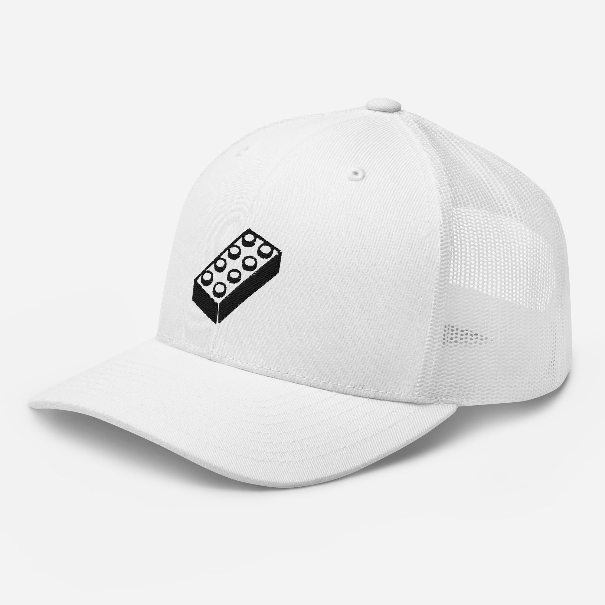 a white trucker cap with a lego embroidered brick design
